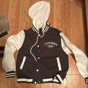 A Charlotterusse jacket, medium and grey.